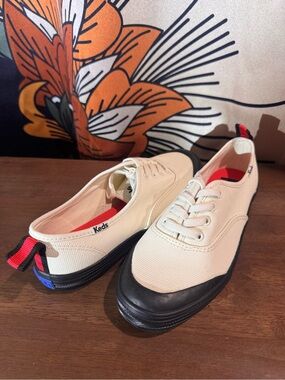 Keds White Canvas Lace-Up Sneakers with Black Trim and Red Insoles